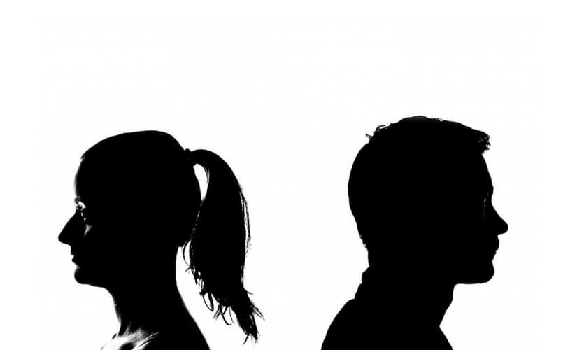 Silhouette of male and female turn away with each other | Stafford, VA | Calinger Law