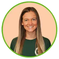 A young woman with long blonde hair smiles, wearing a dark green shirt, against a peach background, inside a green circle.