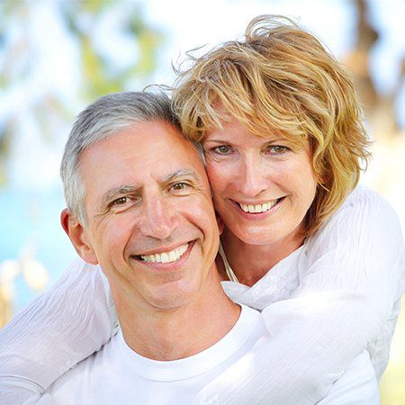 Evaluations — Happy Middle-aged Couple in the Park in Grand Forks, ND