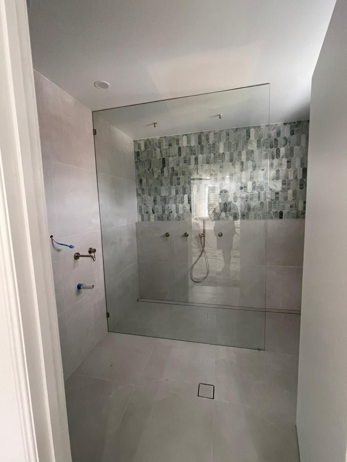 Glass replacement for a shower in the bathroom — Reflect Glass In Tuggerah, NSW