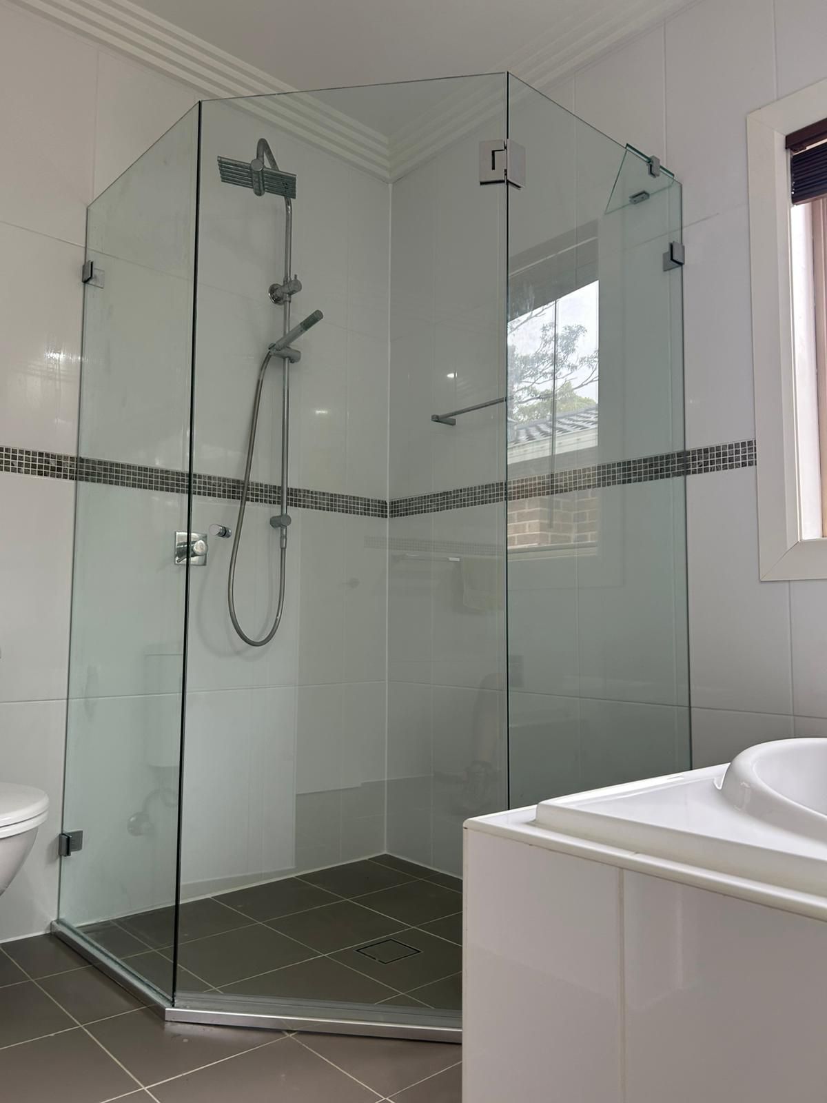 A Bathroom with A Walk in Shower and A Bathtub — Reflect Glass In Tuggerah, NSW