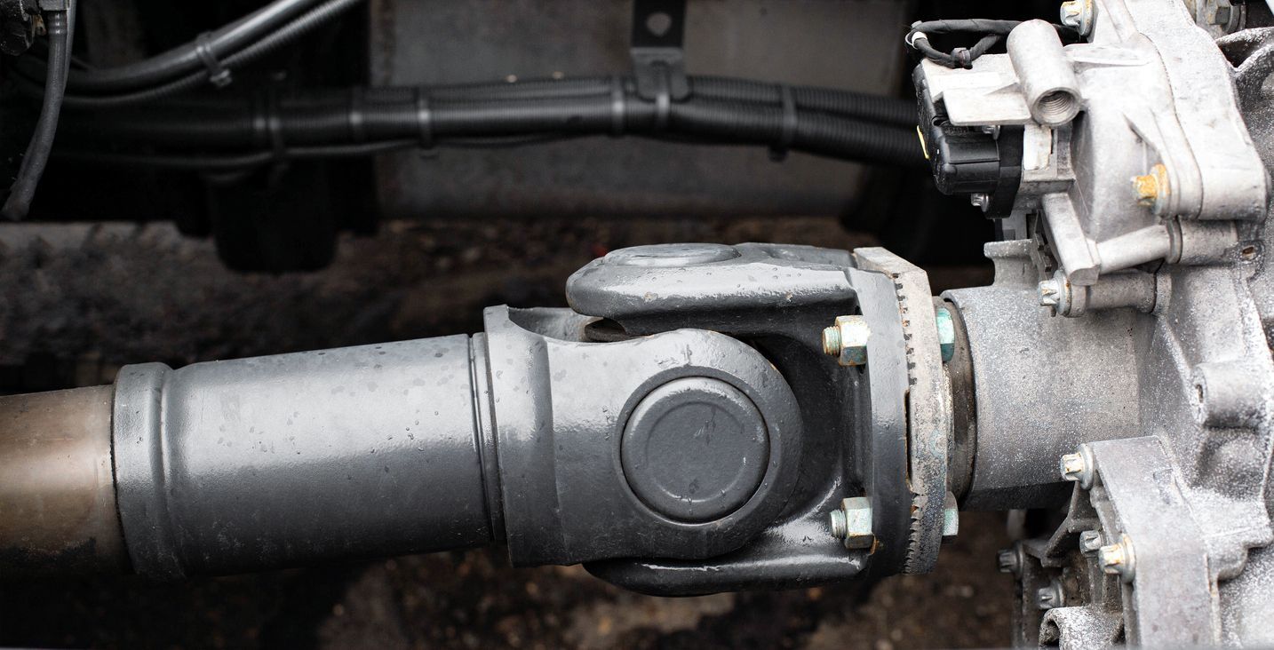 close-up of transmission of a truck transmitting torque arm