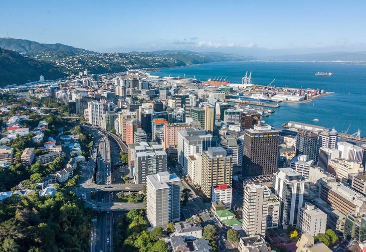 Coastal city skyline with tall buildings Coastal city skyline with tall buildings