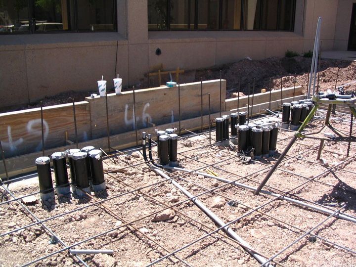 A construction site with the number 46 written on the wall