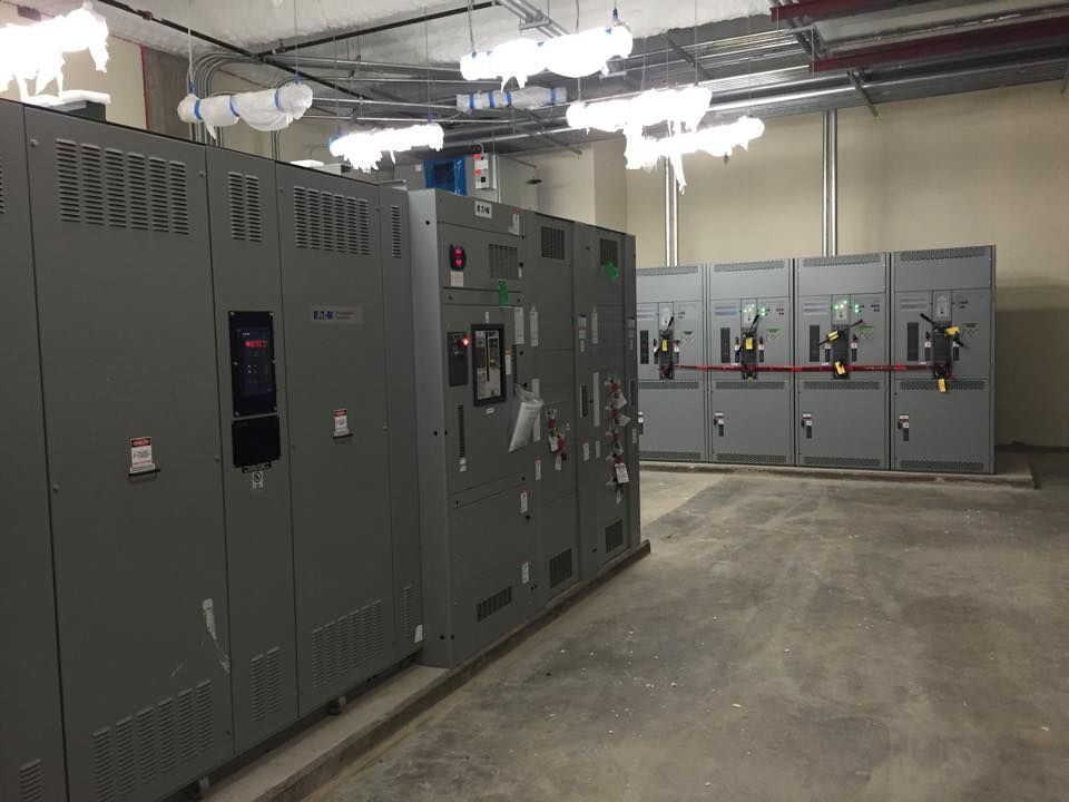 A room filled with lots of electrical boxes and switches.