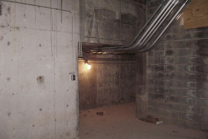 There is a light in the corner of the room.