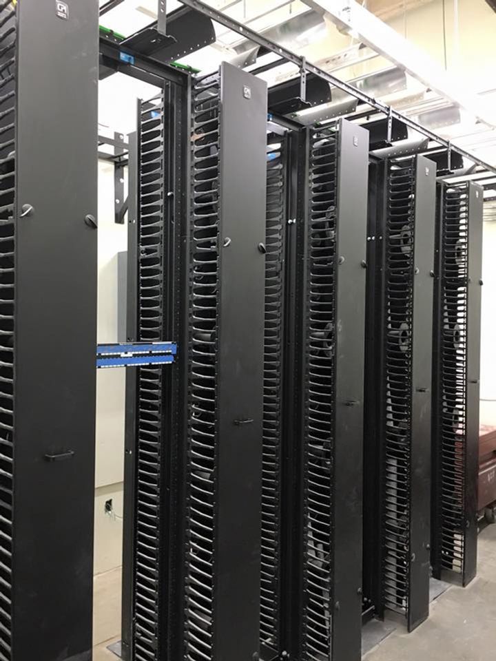 A row of server racks in a data center.