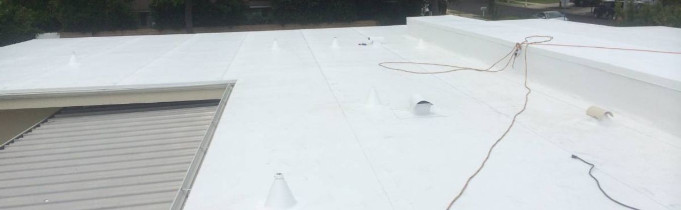 A white roof with a wire hanging from it.