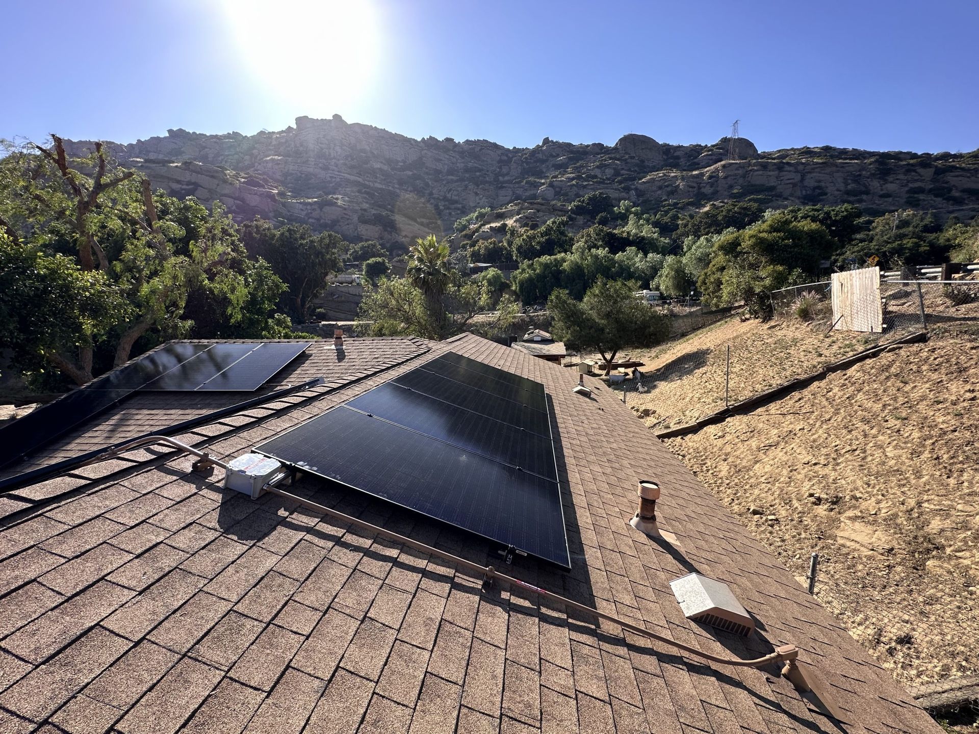 A roof with a lot of solar panels on it