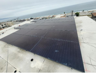 A roof with a lot of solar panels on it