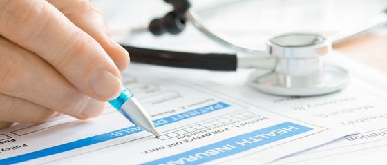 Medical health care expert completing medical claim form in Kailua-Kona, HI
