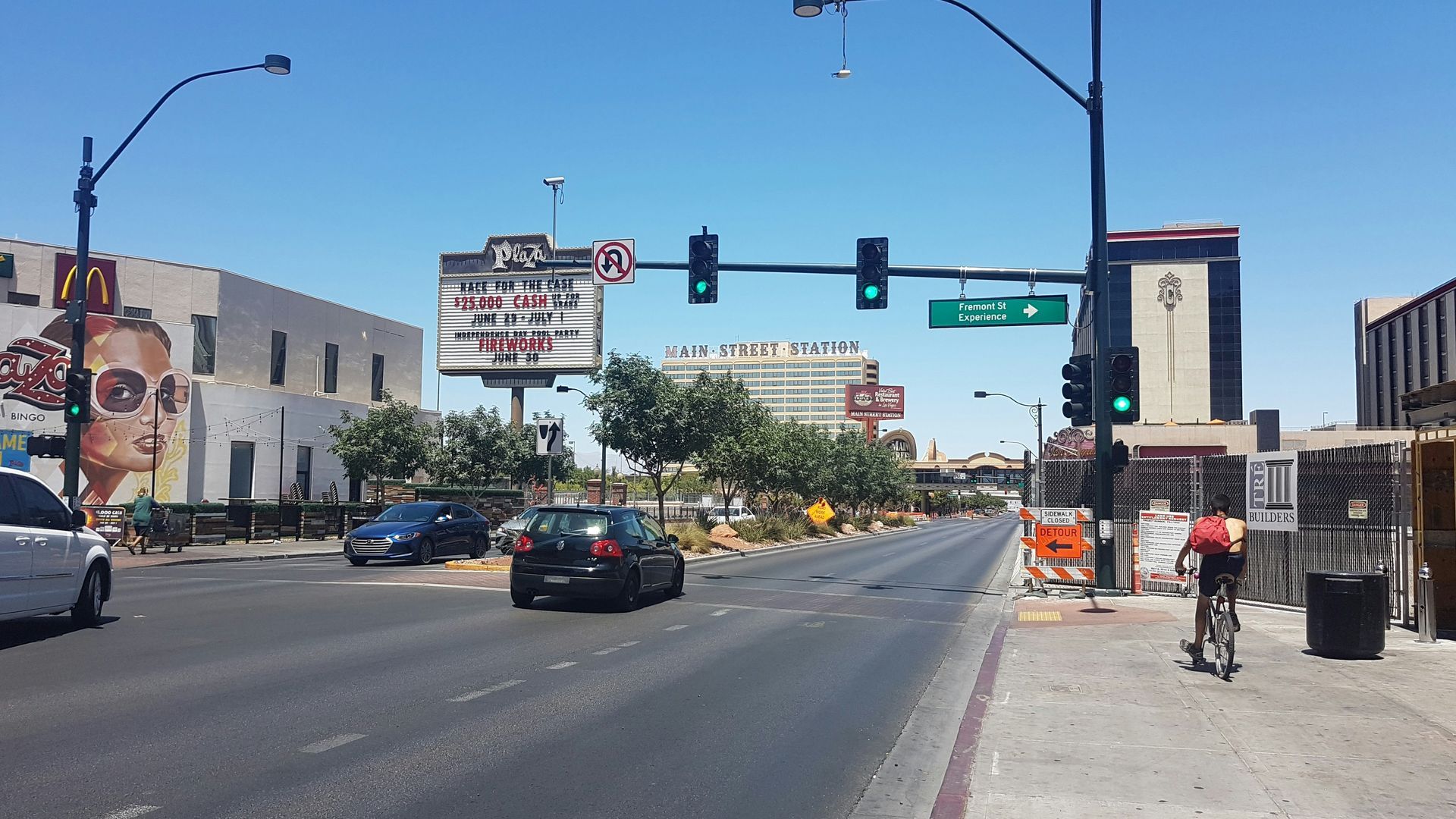 A street in Las Vegas with a cyclist on the sidewalk