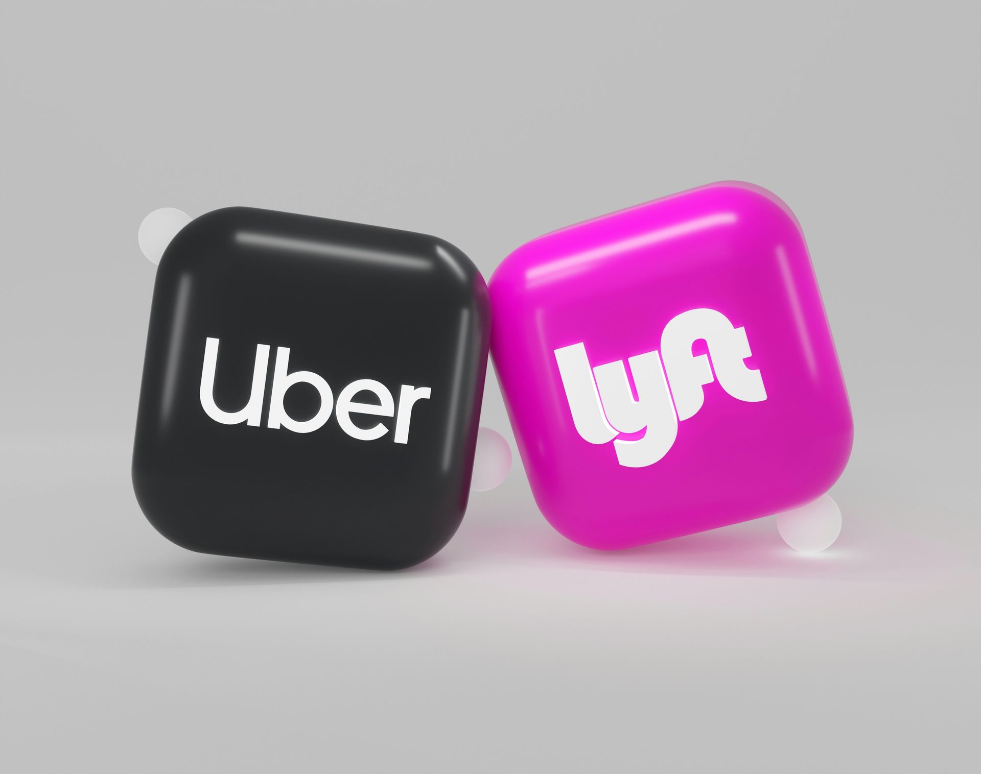 Uber and Lyft logos side‑by‑side, symbolizing rideshare companies in Nevada accident cases.