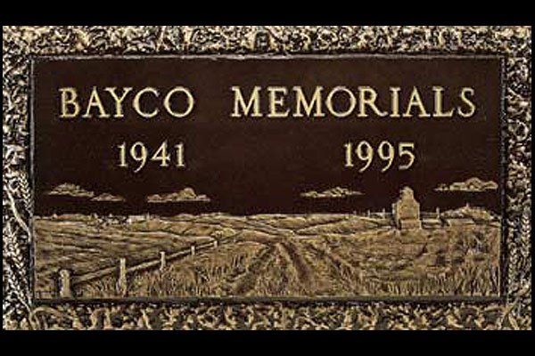 A grave marker for bayco memorials dated 1941 and 1995