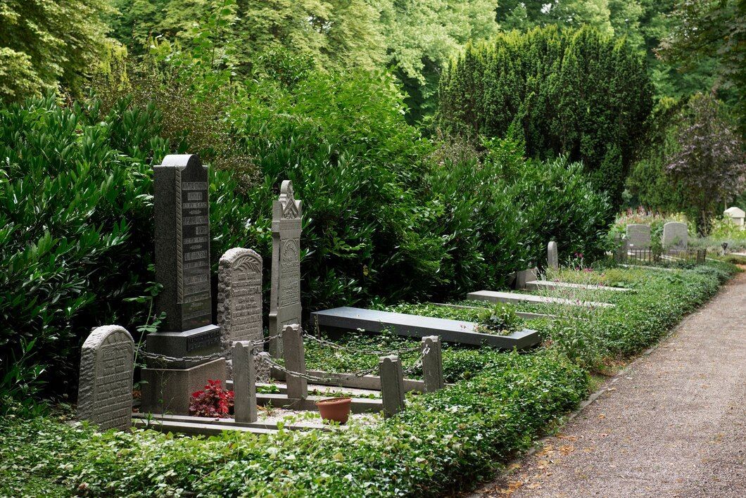 A graveyard filled with lots of graves and trees