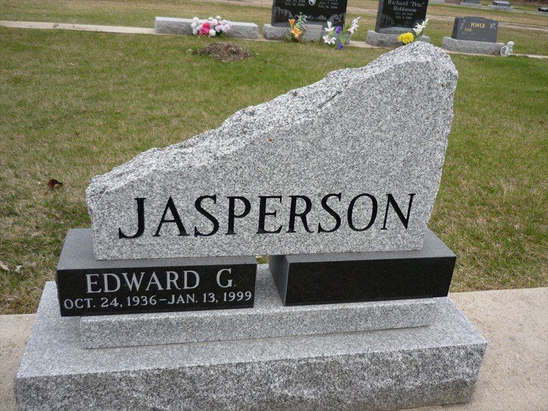 A gravestone for jasperson edward g. in a cemetery