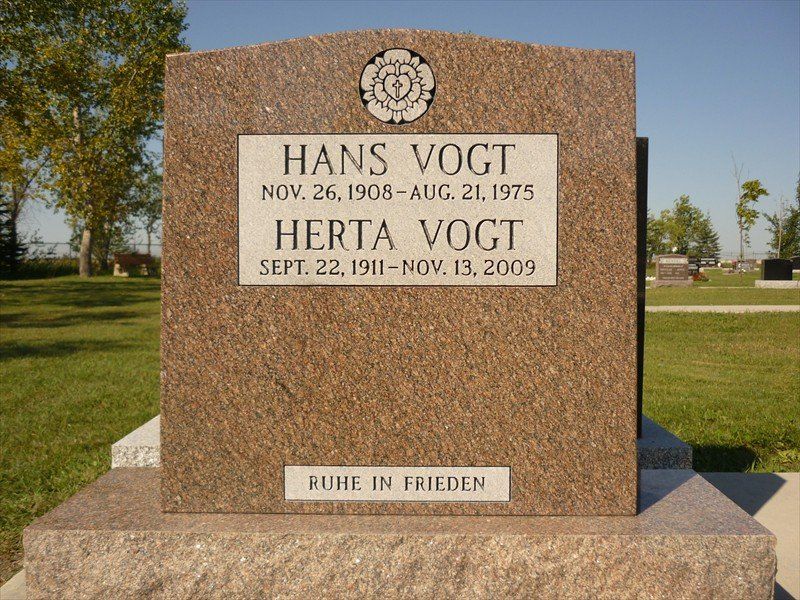 A gravestone for hans vogt and herta vogt in a cemetery