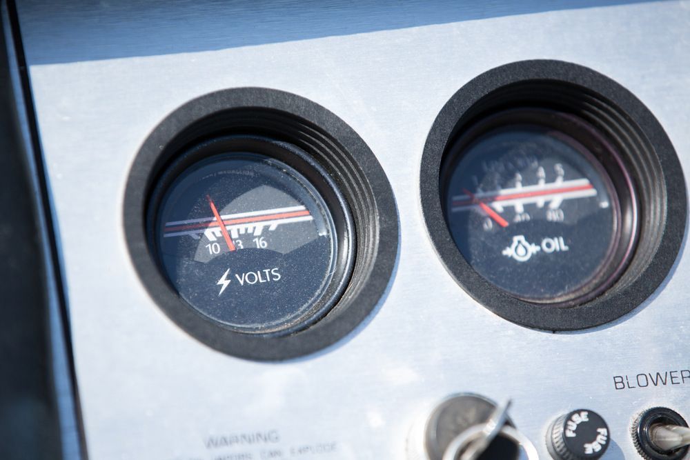 A Close Up Of Two Gauges On A Machine That Says Volts And Oil — Mark's Outboards & More
In Maitland, NSW