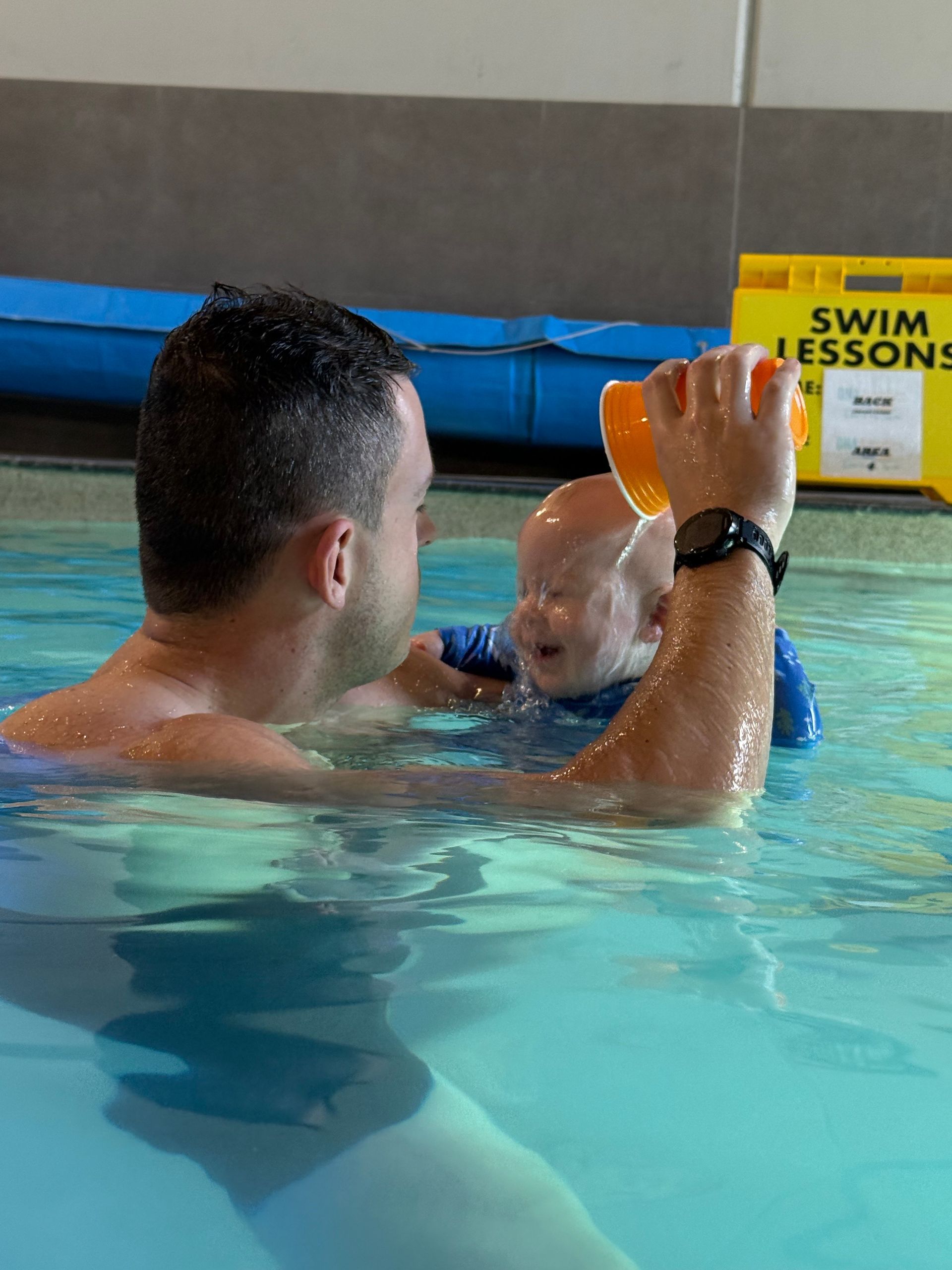 A Group of People Are Swimming in a Swimming Pool — DNA Aquatics in Bundaberg, QLD