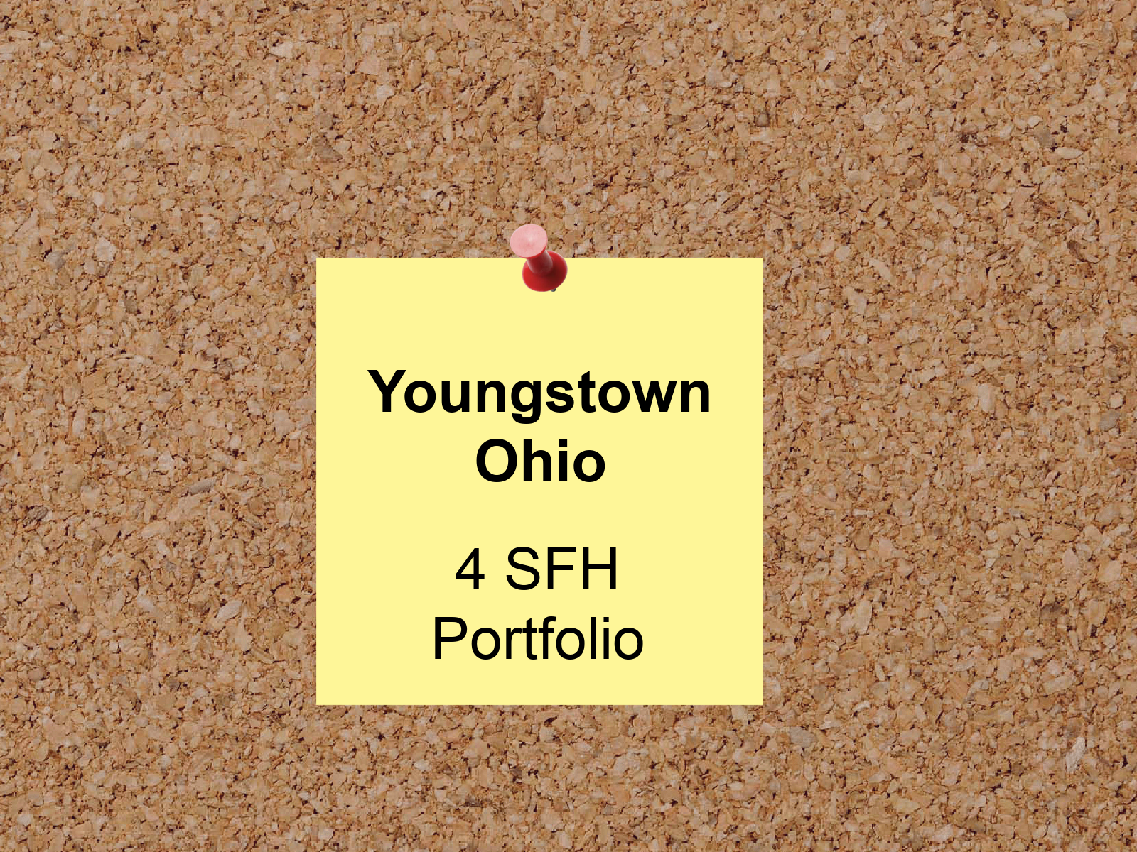 A post it note pinned to a cork board says youngstown ohio