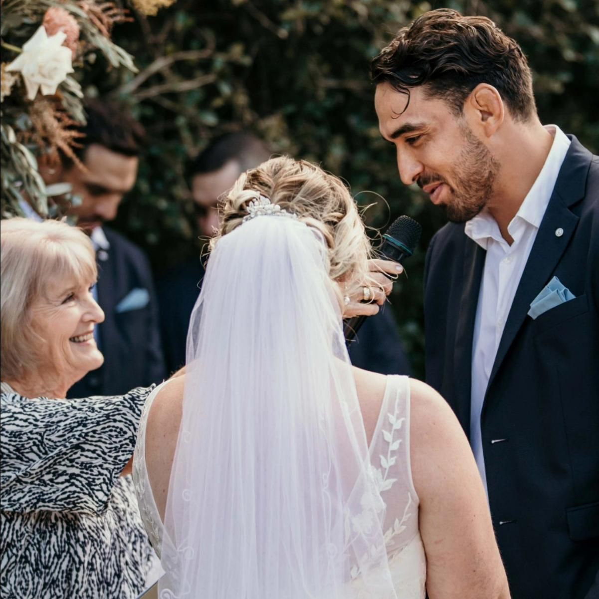 A Man in Blue and A Woman in White Are Holding Hands — Vivienne Celebrant - Gold Coast Wedding Celebrant in Mudgeeraba, QLD