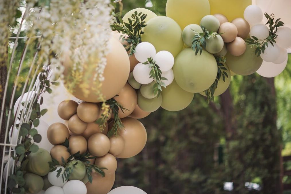 A Long Wooden Table with A Floral Arch — Vivienne Celebrant - Gold Coast Wedding Celebrant in Mudgeeraba, QLD