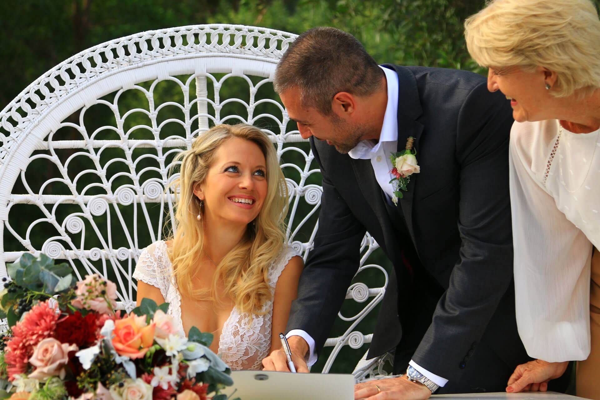 A Bride and Groom Pose with Their Flower Girls — Vivienne Celebrant Gold Coast Wedding Celebrant in Casuarina, NSW