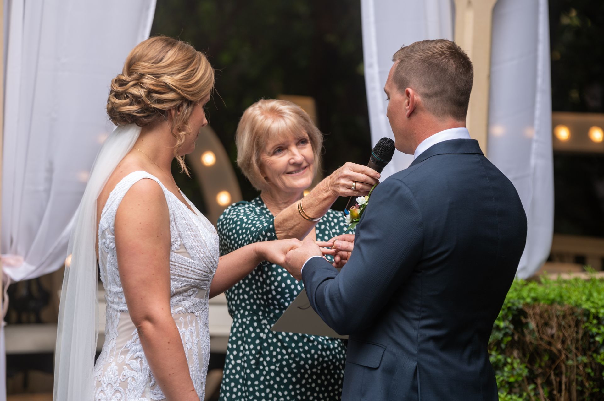 Bride and groom at a wedding announcing their vows