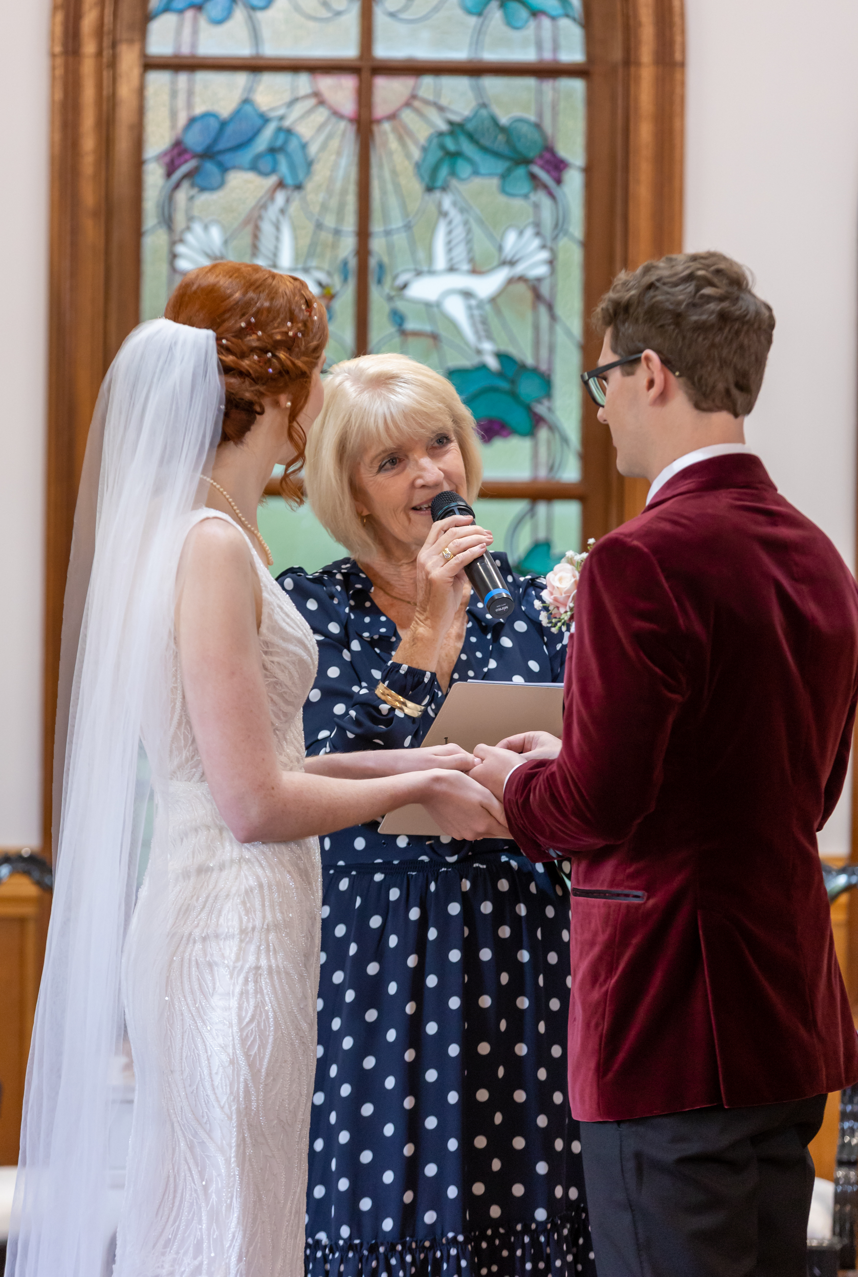 A Woman in Front of A Bride and Groom — Vivienne Celebrant - Gold Coast Wedding Celebrant in Mudgeeraba, QLD