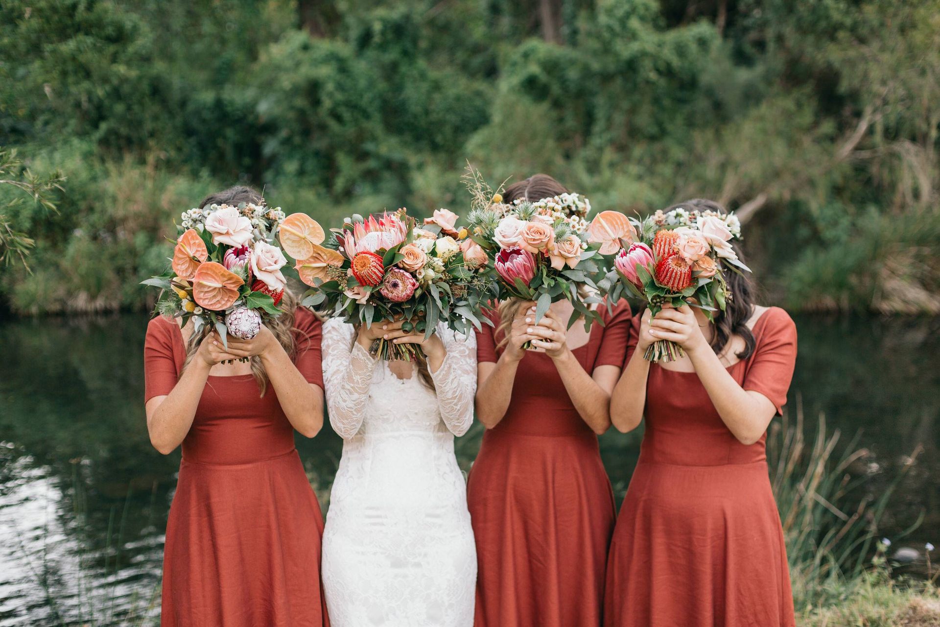 Bride and Groom Are Holding Hands During Their Wedding — Vivienne Celebrant - Gold Coast Wedding Celebrant in Casuarina, NSW