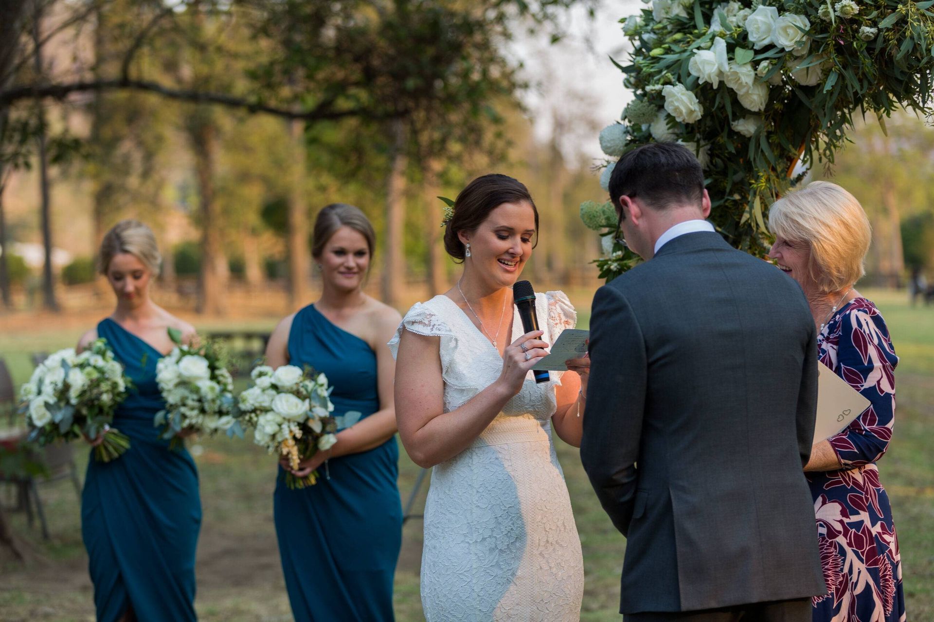 A Bride and Groom Are Getting Married in A Park — Vivienne Celebrant - Gold Coast Wedding Celebrant in Mudgeeraba, QLD