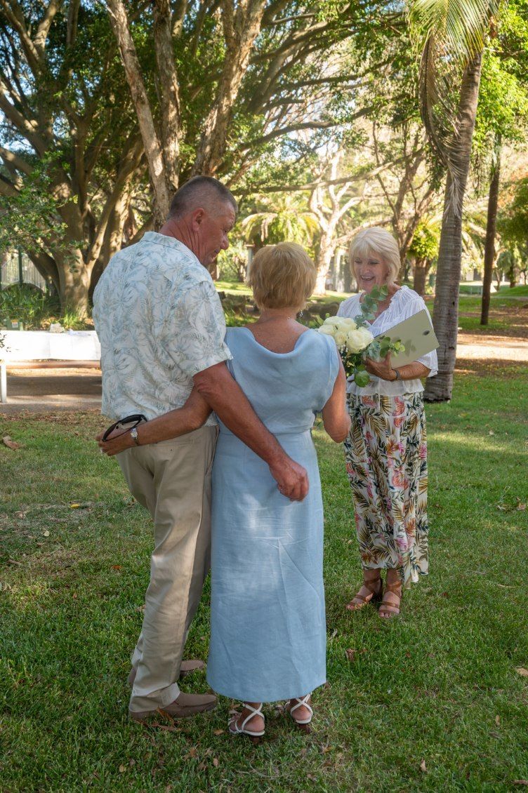 Bride and Groom Are Walking on The Beach Holding Hands — Vivienne Celebrant - Gold Coast Wedding Celebrant in Mudgeeraba, QLD