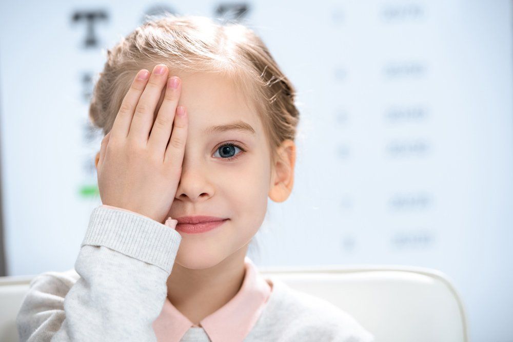 Child Covering Her Eye — Big Rapids, MI — Crew & Boss Eye Associates