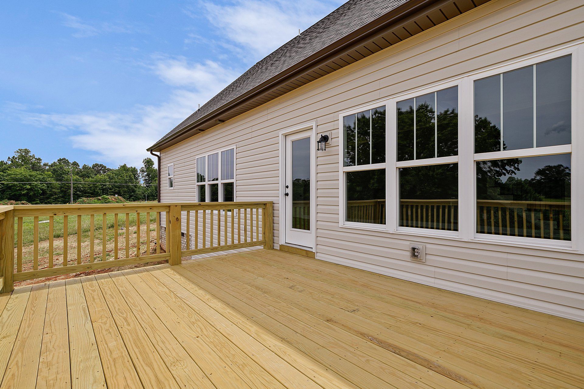 Beautiful Porch In Woods — Greensboro, NC — Sparks Homes & Home Renovations Inc