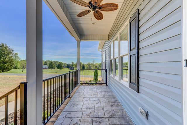Front Porch With Ceiling Fan — Greensboro, NC — Sparks Homes & Home Renovations Inc