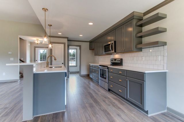 Kitchen With Gray Cabinets — Greensboro, NC — Sparks Homes & Home Renovations Inc