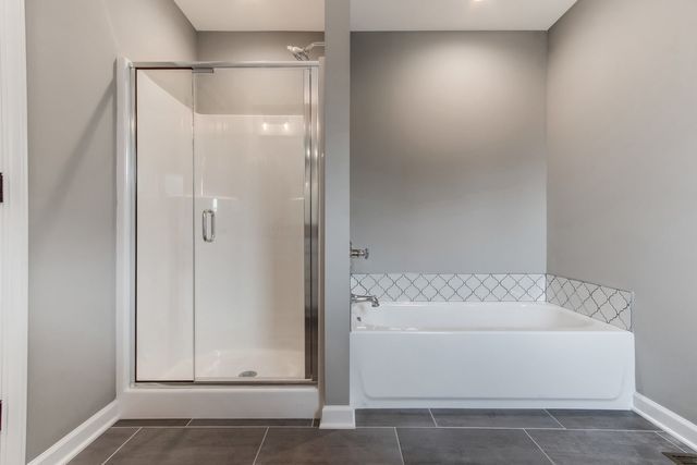 Bathroom With Bath Tub — Greensboro, NC — Sparks Homes & Home Renovations Inc