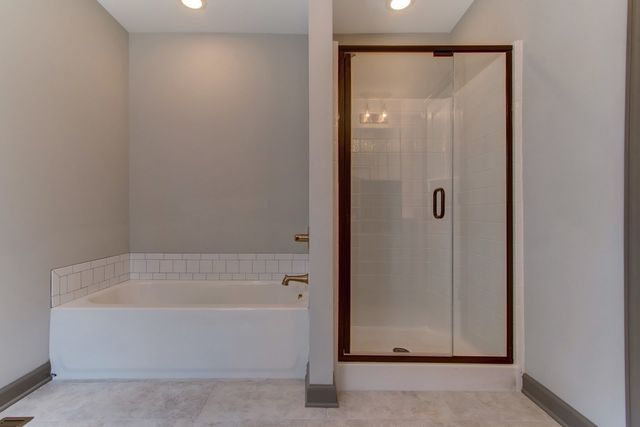 Bathroom With Glass Door — Greensboro, NC — Sparks Homes & Home Renovations Inc