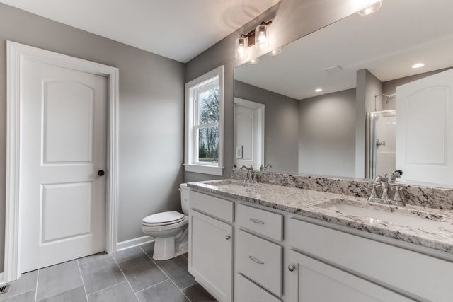 White Bathroom With Window — Greensboro, NC — Sparks Homes & Home Renovations Inc
