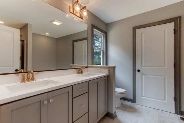 Bathroom With Lights — Greensboro, NC — Sparks Homes & Home Renovations Inc