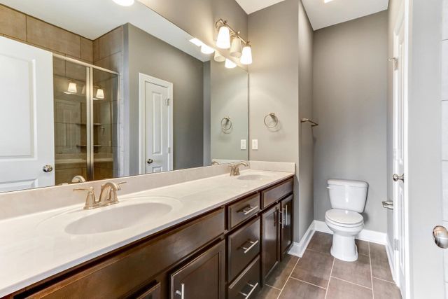 Bathroom With Mirror — Greensboro, NC — Sparks Homes & Home Renovations Inc