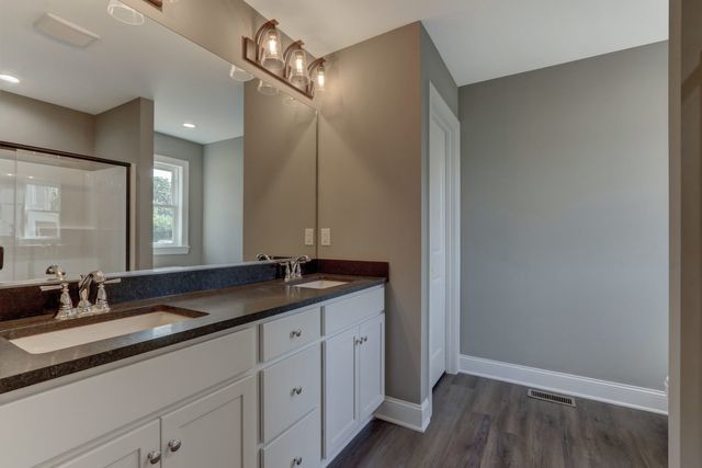 Bathroom With Black Sink — Greensboro, NC — Sparks Homes & Home Renovations Inc