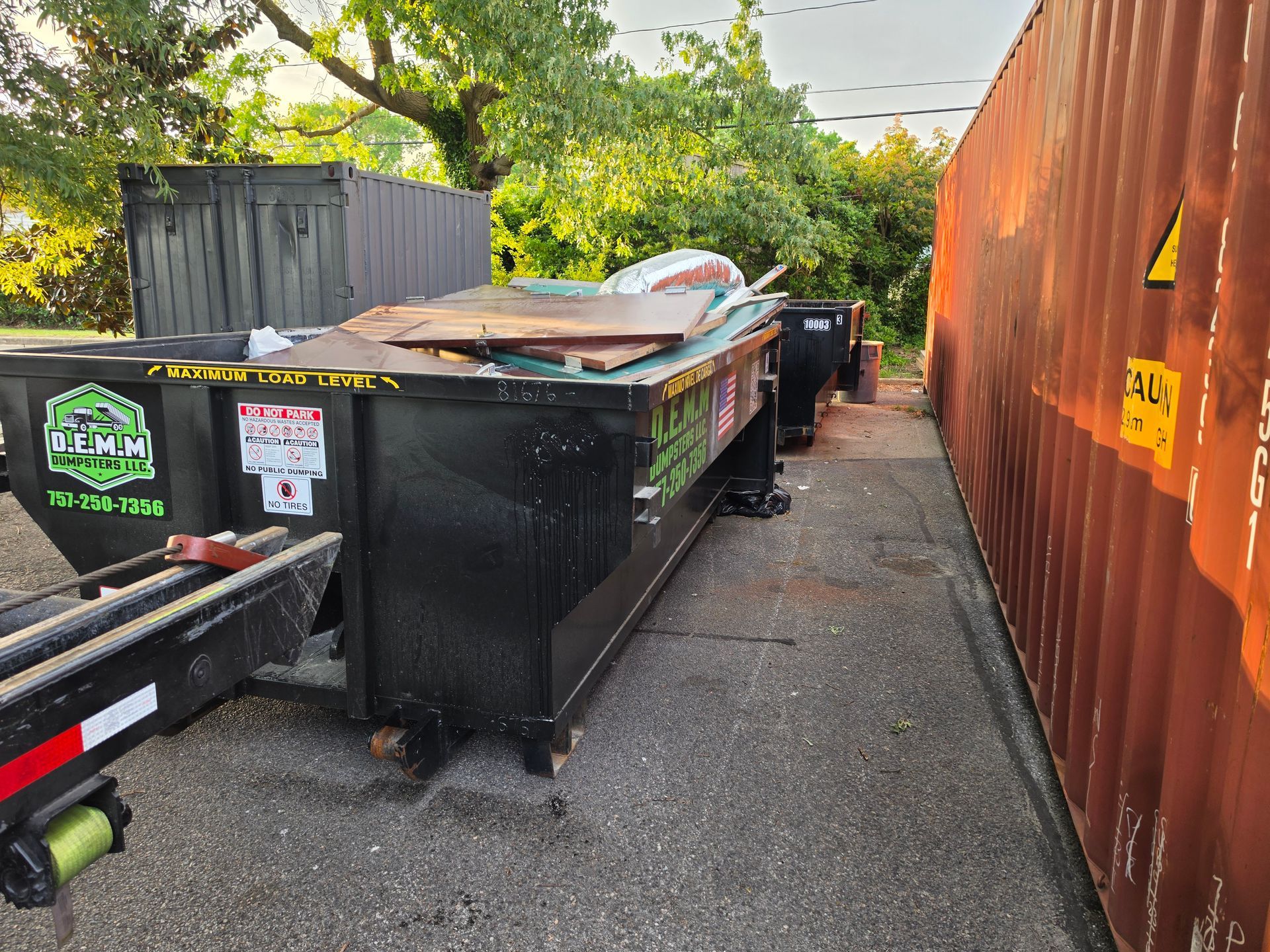 10 yard dumpster from D.E.M.M. Dumpsters