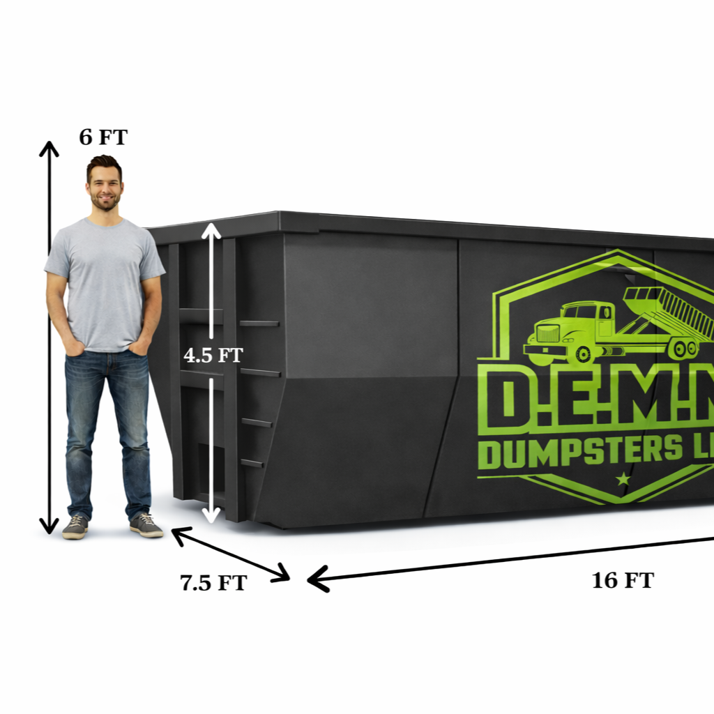 Two bright green industrial dumpsters sit outside, with lumber and pallets in the background.