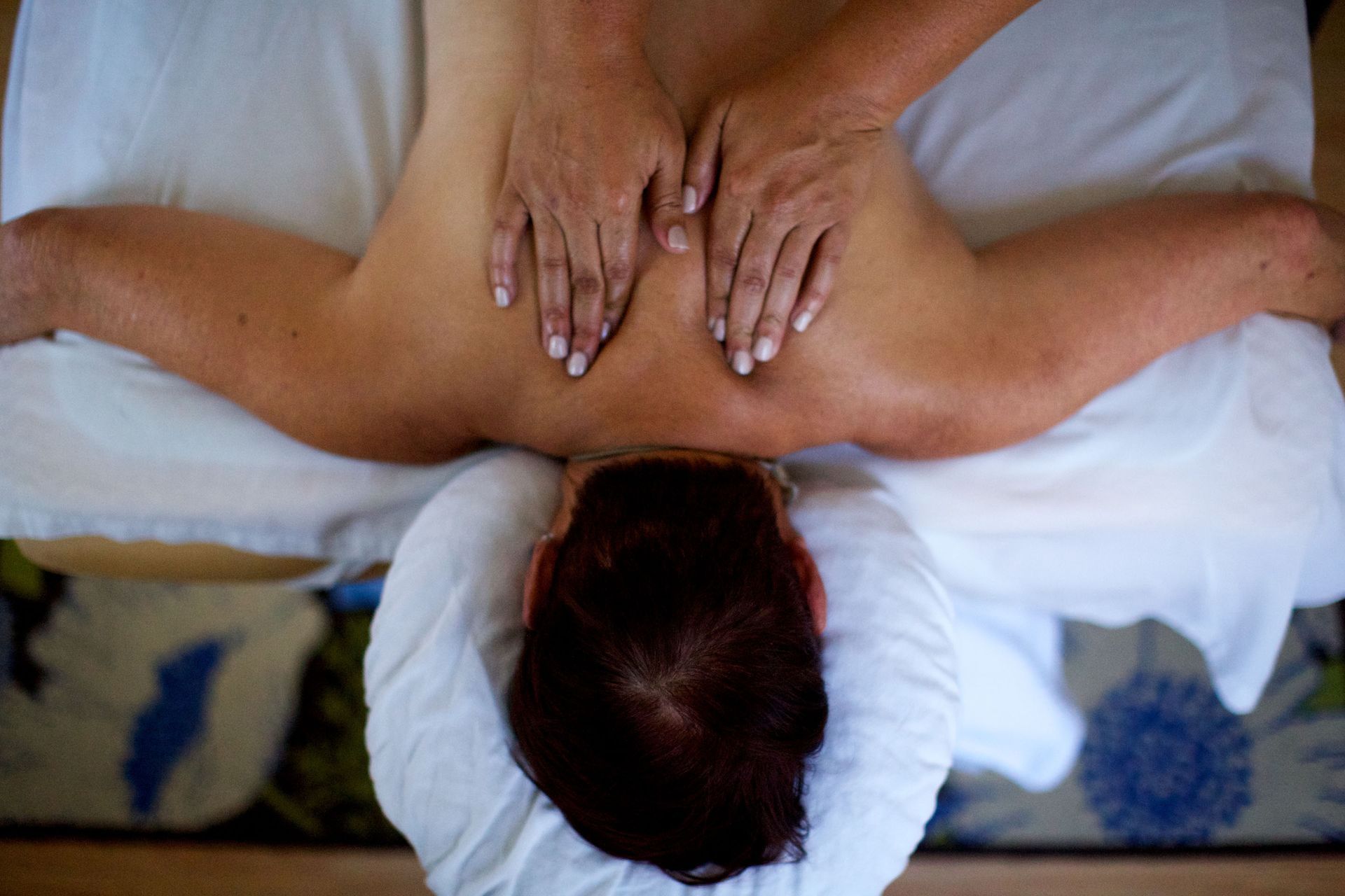 Man Having Massage In Spa Salon