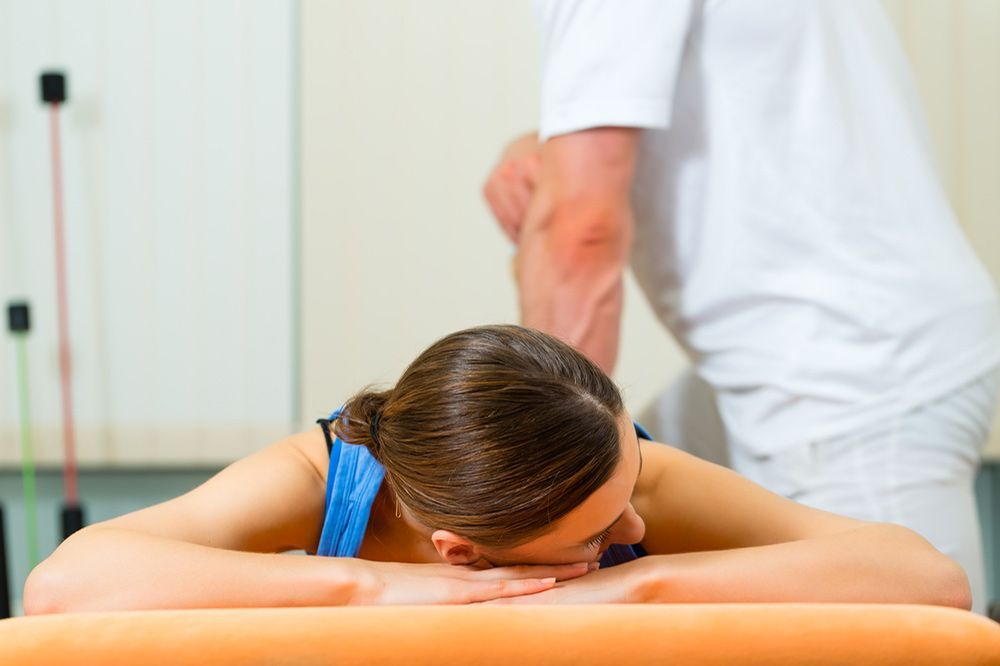 Therapeutic Massage On A Massage Couch