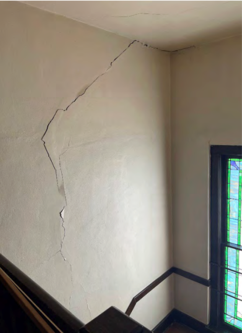 Cracks opened up in the lathe and plaster wall construction inside the building and can be seen running through bricks and mortar outside.
