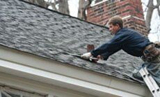 Man Repairing Roof — Roofing Services in Dr. Santa Maria, CA