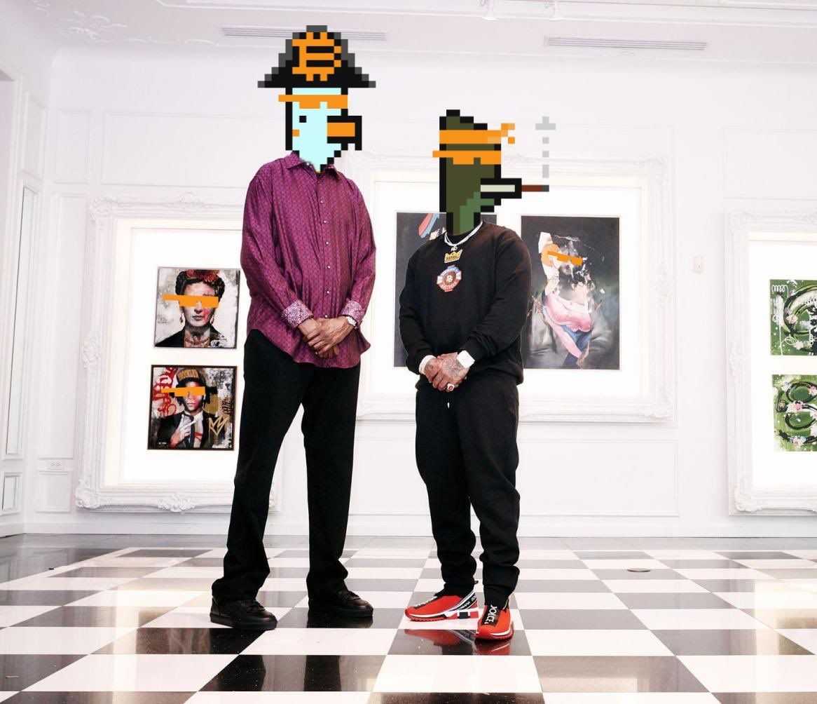 Two men are standing next to each other in a room with a checkered floor.