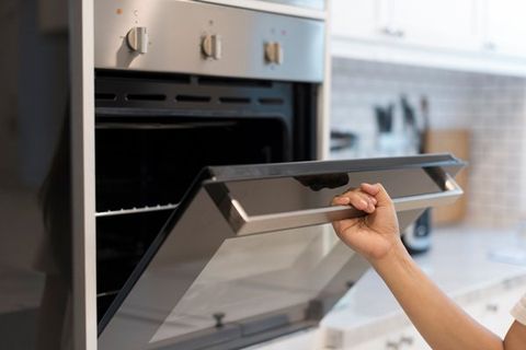 arm opening new oven